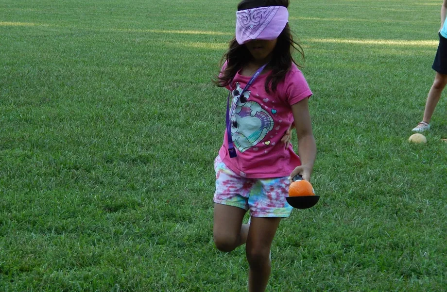 Campers taking part in an outdoor activity at a Foster Hope camp